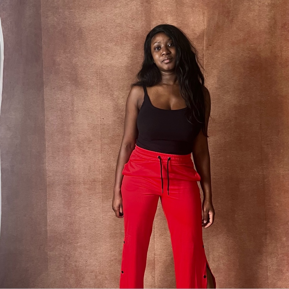 38.Forever 21 red joggers with buttoned up slits NWOT size M